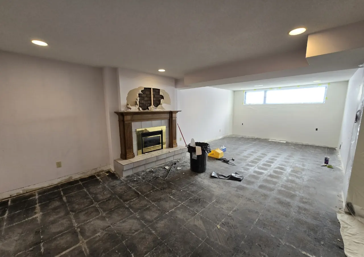 Basement family room during floor removal before renovation